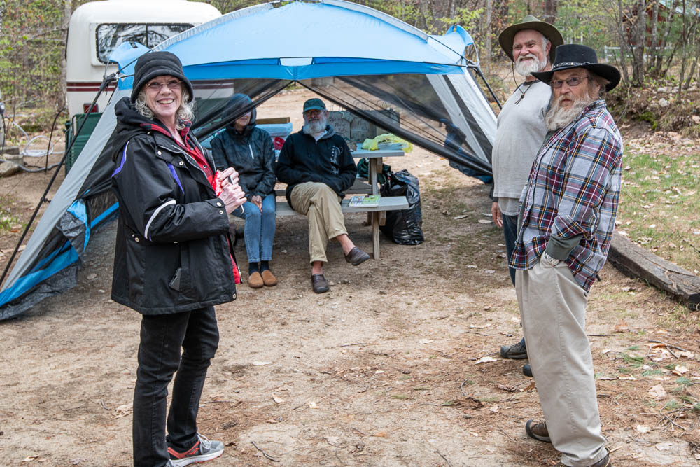Spring Fling in New England visiting at camp with fiberglass trailer in the background