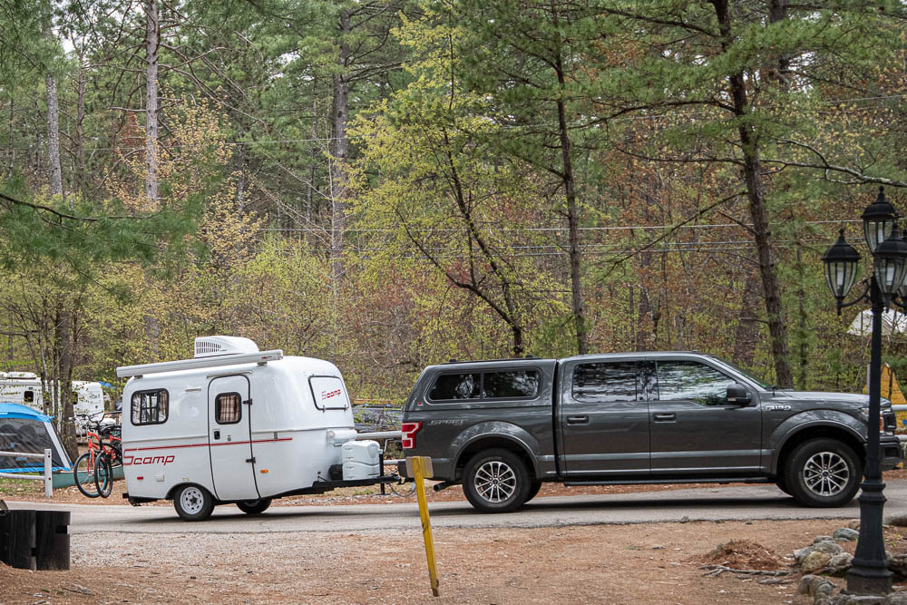 Spring Fling in New England fiberglass trailer rally with truck pulling fiberglass camper trailer.
